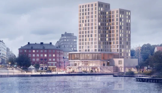 Exteriör av Clarion Hotel i Södertälje vid vattnet.